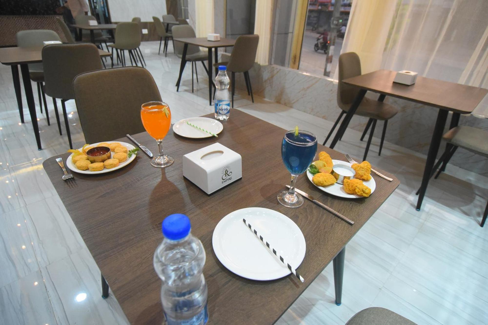 R Empire Revtree Hotel Davangere Bagian luar foto