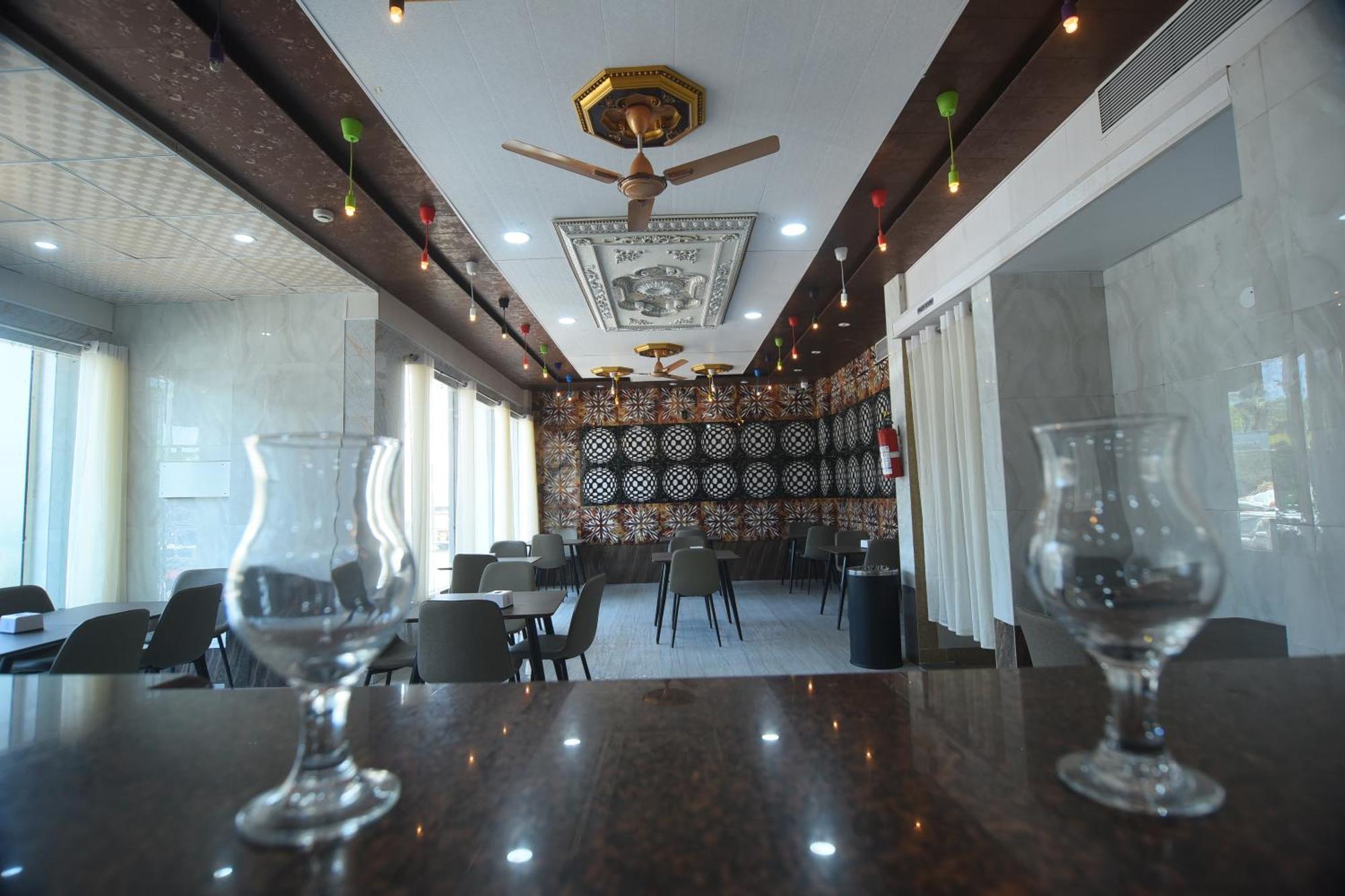 R Empire Revtree Hotel Davangere Bagian luar foto