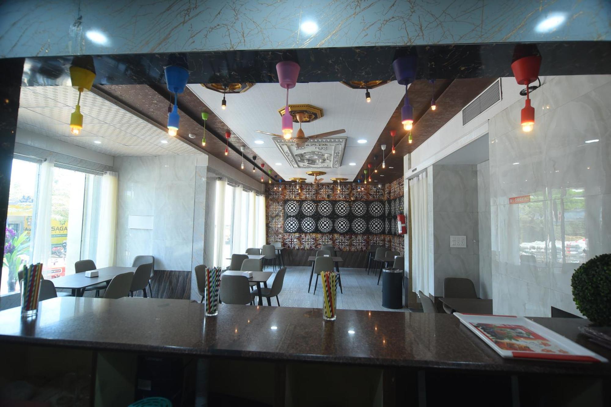R Empire Revtree Hotel Davangere Bagian luar foto